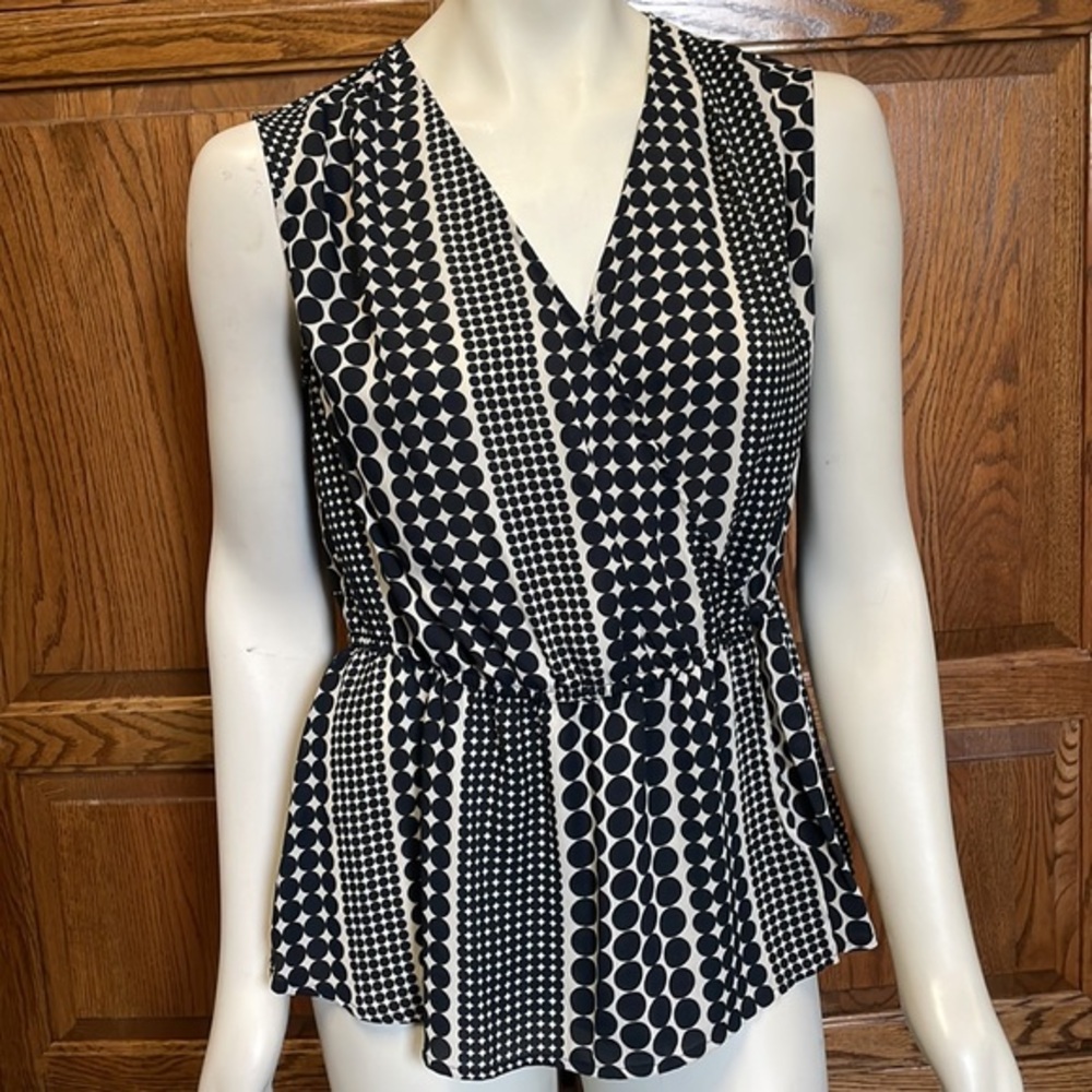 Women’s wrap polka dot peplum top